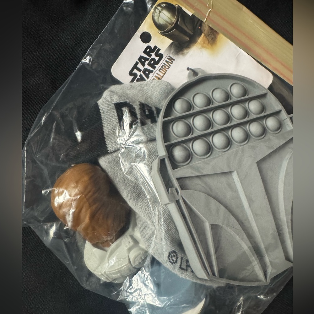 Star Wars socks , silicone trivet and two mc Donald’s toys